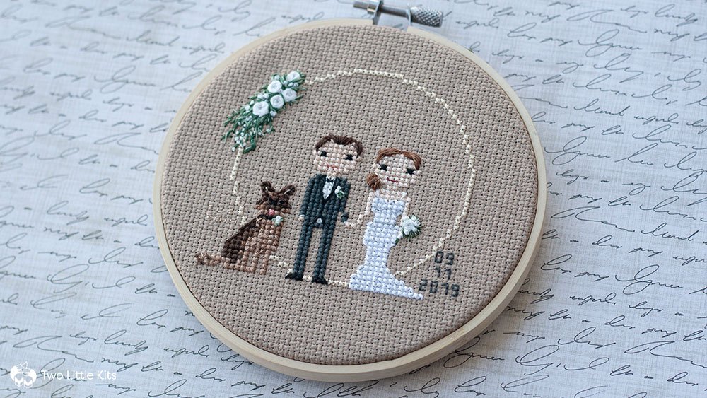 Cross-stitch finished piece: A wedding piece including the bride and groom, and their german shepherd