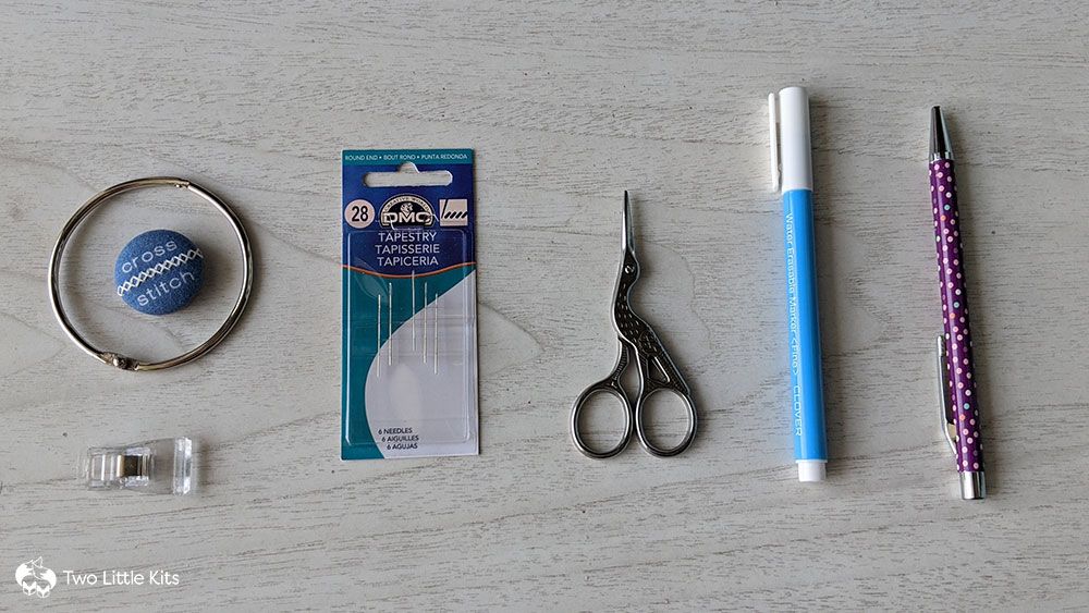 Embroidery supplies in a flat lay