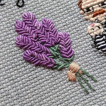 Lavendar stitched using bullion stitches and stem stitch