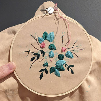 Unnamed embroidery piece is underway! So far, leafy things are done but a bit of florals have emerged, too.