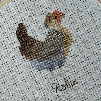 A cross-stitch chicken called 